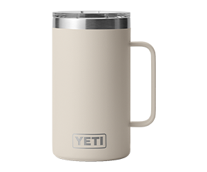 Yeti Roadie 15 hard cooler in Tan and Yeti Rambler 24 ounce stackable mug in Cape Taupe